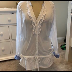 This is a beautiful clean cut white shirt.